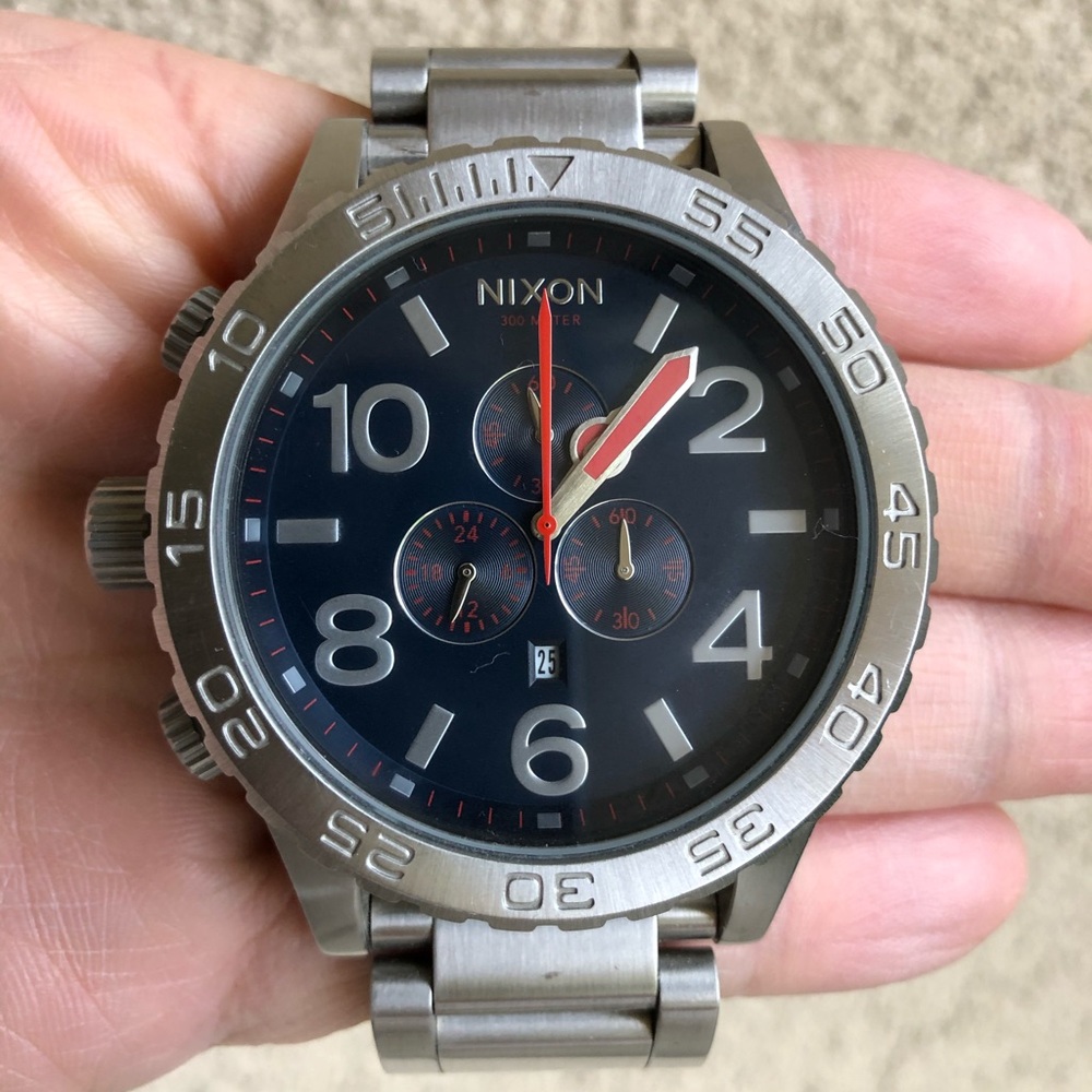 Men’s Nixon watch 51-30
Red hands with a Blue face